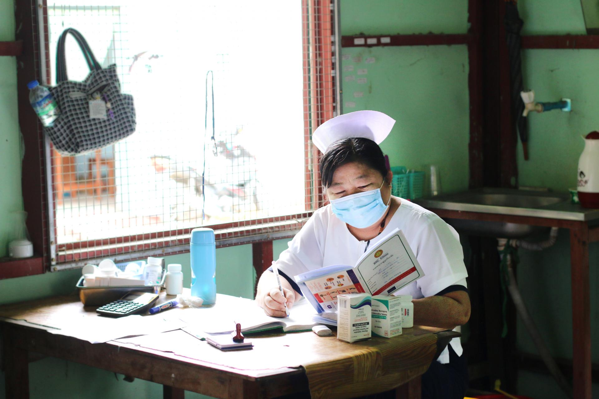 A healthcare provider at the Union’s IHC clinic in Amarapura Township Health Center providing HIV Care and support. Photo: The Union