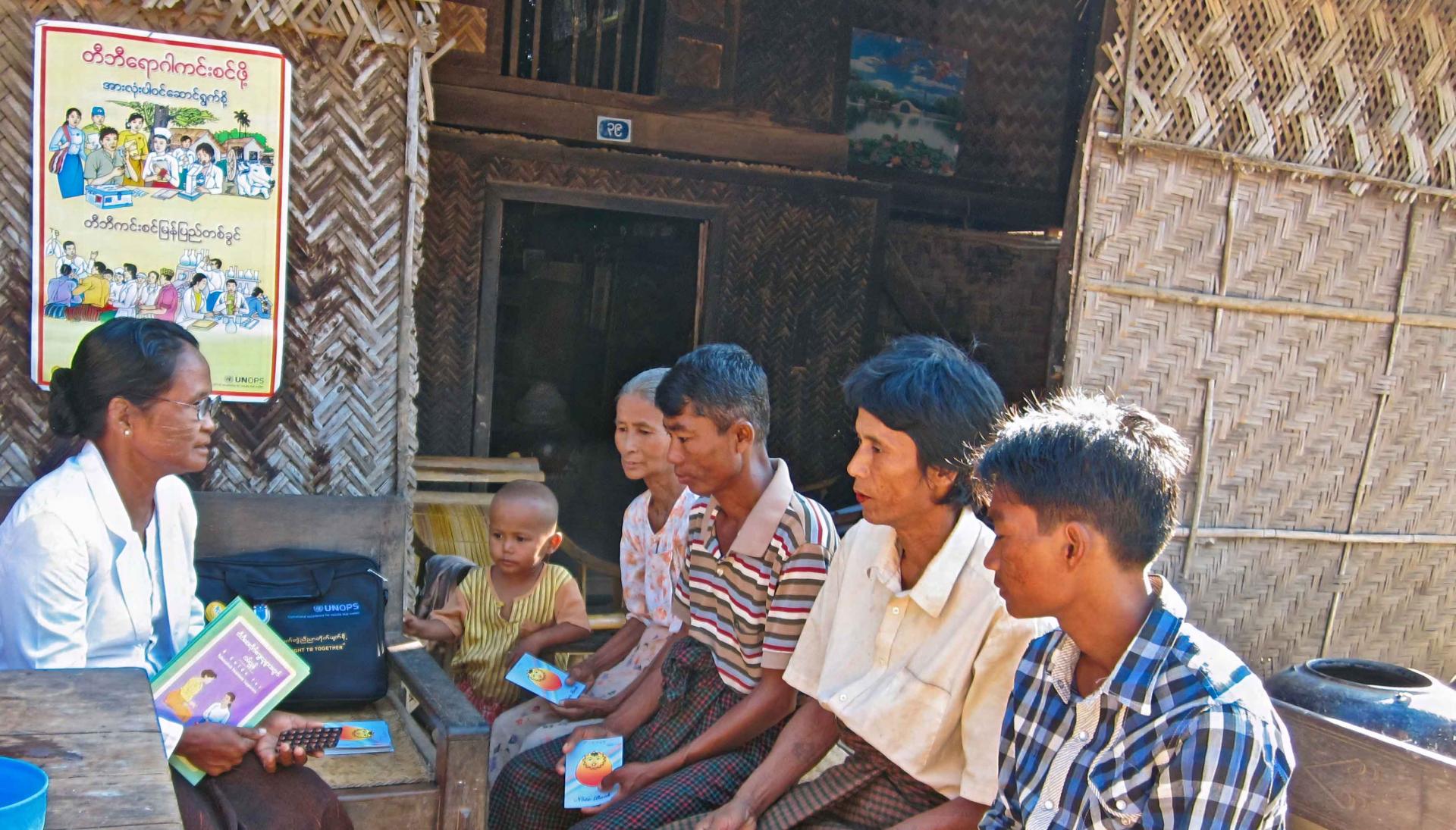 Daw Khin Pyone Oo, a volunteer from the Myanmar Health Assistant Association assesses patients during a community visit. Since this Global Fund supported project began, more villagers are having sputum check-ups, leading to a higher tuberculosis detection rate.  Let Pan Zaut village, Mahlaing township, Mandalay Region. Photo: UNOPS