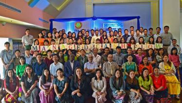 Dr Zaw Myint, Regional Officer and Senior Consultant TB Specialist, National TB Programme, MOHS, and Dr Faisal Mansoor, Head of Programme, Dan Magambo, Financial Management Specialist, UNOPS-PR, together with UNOPS-PR Field Finance Assistants at the half-yearly review meeting in Yangon.    Photo: UNOPS