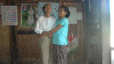 Joyful Ma Thida together with her mother at their home in Ma Gyee Pin Su village, Meiktilar township. Photo: MHAA