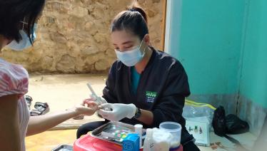 A peer educator conducting HIV case-based surveillance among female sex workers in Hpakant township. Photo: Medical Action Myanmar 