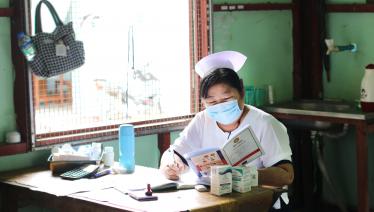 A healthcare provider at the Union’s IHC clinic in Amarapura Township Health Center providing HIV Care and support. Photo: The Union