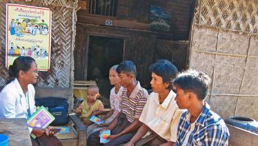 Daw Khin Pyone Oo, a volunteer from the Myanmar Health Assistant Association assesses patients during a community visit. Since this Global Fund supported project began, more villagers are having sputum check-ups, leading to a higher tuberculosis detection rate.  Let Pan Zaut village, Mahlaing township, Mandalay Region. Photo: UNOPS